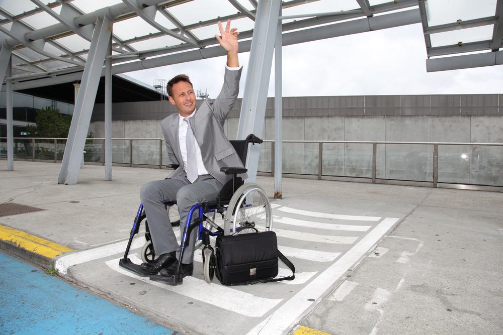 Disabled Person at an Airport Pedestrian Intersection