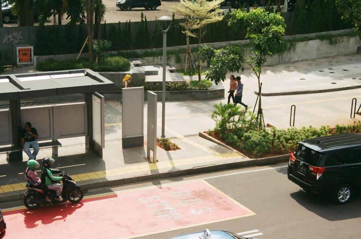 People Walking on Sidewalk with Detectable Warning Tiles